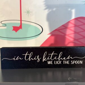 In this kitchen we lick the spoon sign