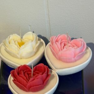 Rose candle in heart shaped dish