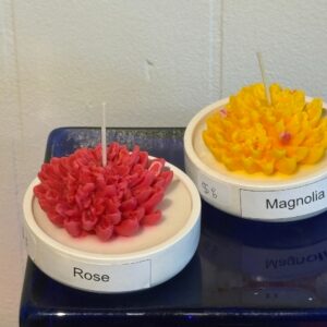 chrysanthemum candle in round dish