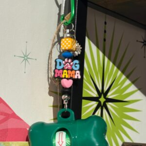 Doggie poop bags on carabiner clip with charms Green