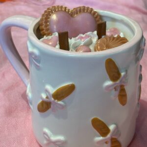 Hearts bows & shells candle in ceramic mug with bows