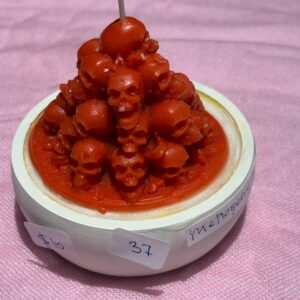 Pile of skulls Halloween Candle in round dish