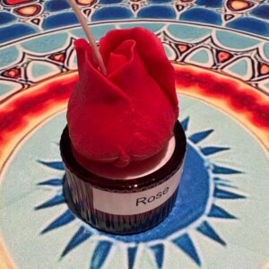 rose candle in glass jar