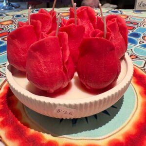seven roses in a bowl candle
